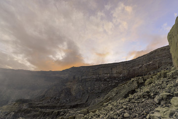 Sunrise - Dawn on Kawah Ijen Volcano of East Java in colurful sky day, Indonesia.
