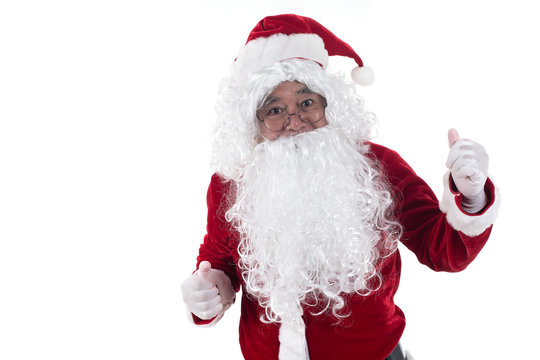 Portrait of Santa Claus standing with thumbs up isolated on white background