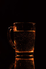 water on a glass on dark background.