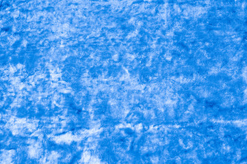 Fototapeta na wymiar Texture, background, pattern. Cloth velvety blue. Gorgeous silk velvet fabric is a first quality velvet. The fabric is extremely soft and has a plushy texture to it.