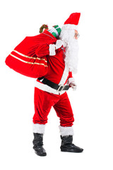 Santa Claus with a bag full of presents isolated on white background.