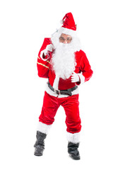 Santa Claus with a bag full of presents isolated on white background.