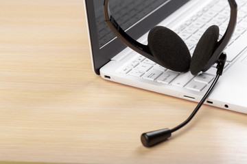 headset on keyboard computer laptop