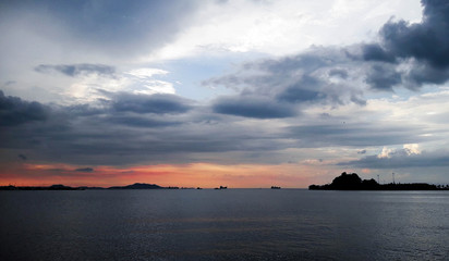 Fototapeta na wymiar Colorful of sunset with sea silhouette background 