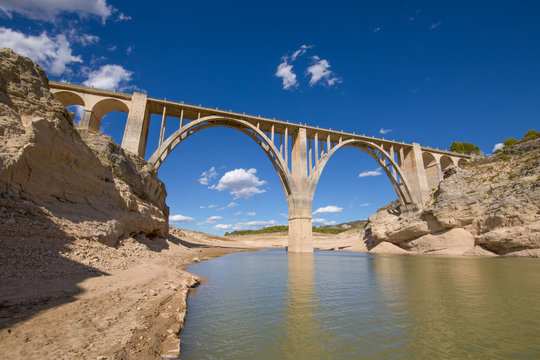 landscape of viaduct in Entrepenas reservoir, with extreme drought and low level water, in Guadalajara, Castile, Spain Europe
