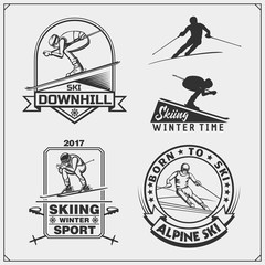 Fototapeta premium Set of winter sports emblems, labels and design elements. Skiing, downhill, slalom.
