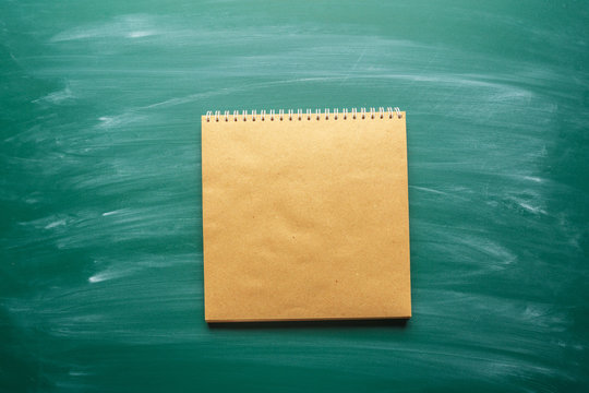 note paper on chalkboard for text