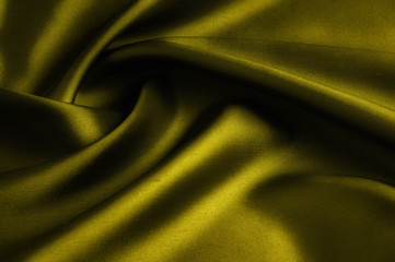 Soft focus. texture, pattern. cloth silk yellow. Mustard washed Silk Crepe de Chine. Bright mustard...