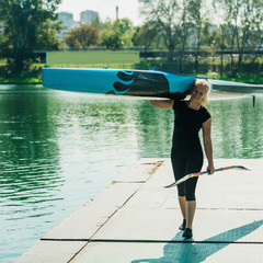 Female kayaker with her boat