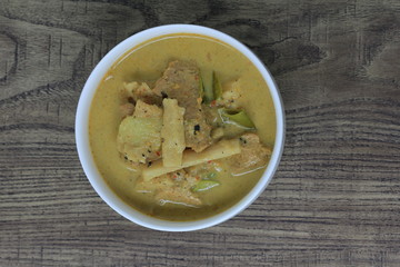 Thai food, young bamboo shoot with pork bone curry on wooden background