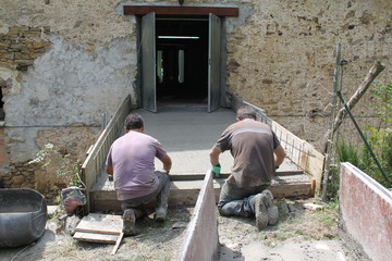 men working with cement