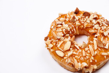 Delicious donut with almond caramel glazed, Isolated on white background.