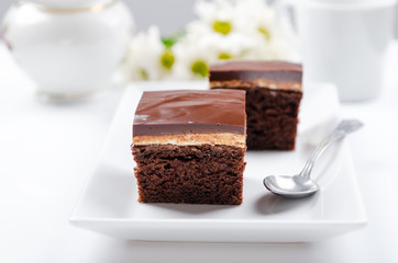 Dark chocolate cake with white cream