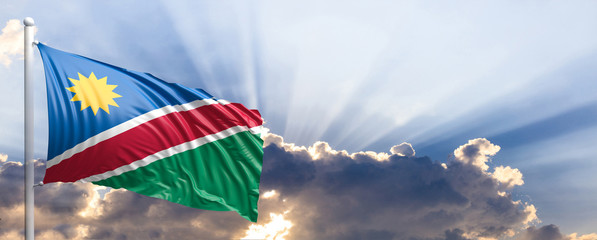 Namibia flag on blue sky. 3d illustration