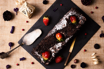 Christmas chocolate cake with strawberries