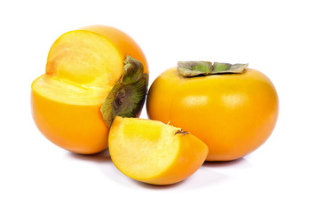 fresh ripe persimmons isolated on white background