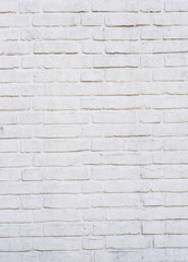 vertical part of white painted brick wall