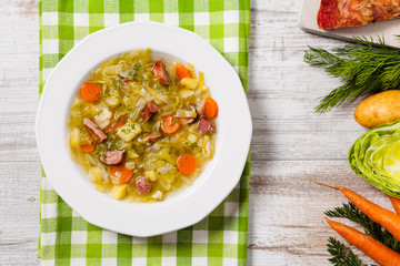 Homemade cabbage soup, cooked on smoked ribs.