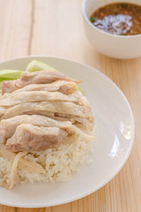 Obraz na płótnie Canvas Hainanese chicken rice or rice cooked in chicken broth