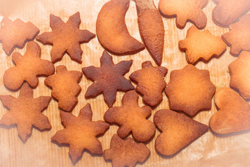 Baked shortbread cookies. Different forms of cookies. New Year. Christmas. Food. Home kitchen. Soft light vignetting.