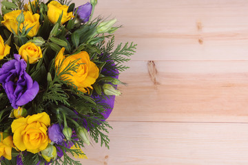 Flowers on wooden background. Copi space