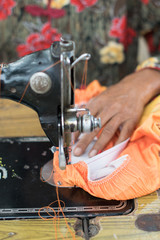 .Women are sewing