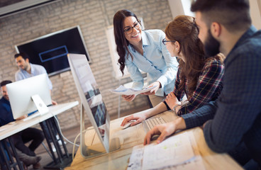 Corporate teamworking colleagues in modern office