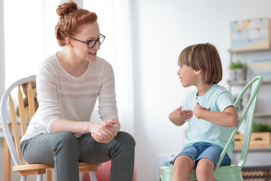 Boy talking with child psychotherapist