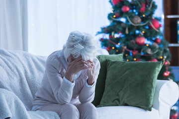 Senior female sitting alone