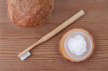 coconut oil toothpaste, natural alternative for healthy teeth, wooden toothbrush, above