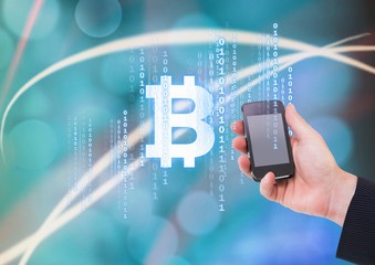 Bitcoin icon interface and hand holding phone
