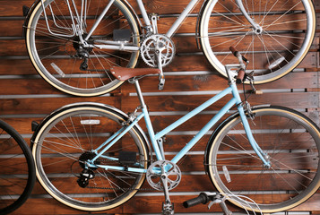 Fototapeta na wymiar Stand with new bicycles in shop