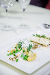 Chef s specialty presented in restaurant on served table