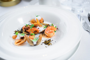 Chef s specialty presented in restaurant on served table