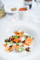 Chef s specialty presented in restaurant on served table