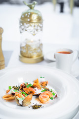 Chef s specialty presented in restaurant on served table