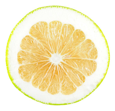Slice of yellow grapefruit isolated on white background