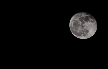 Framing the moon in the sky