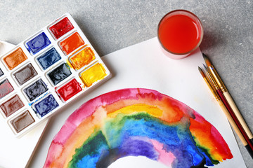 Naklejka premium Watercolor painting of rainbow on grey background