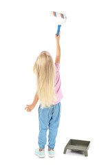 Cute little girl with paint roller on white background