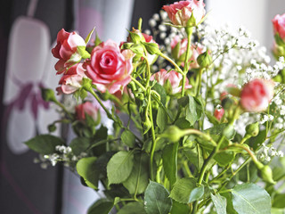 Bouquet for the holiday the girl in the form of a dwarf pink roses
