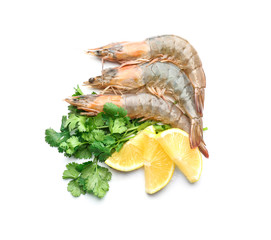 Fresh shrimps with slices of lemon on white background