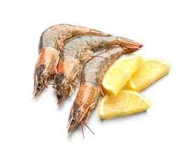 Fresh shrimps with slices of lemon on white background