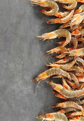 Many fresh shrimps on table