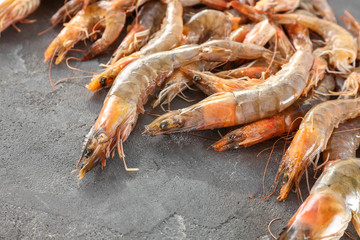 Many fresh shrimps on table