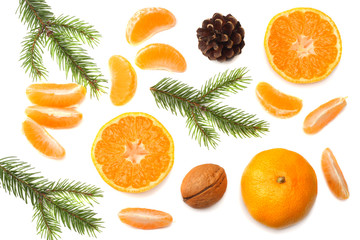 Christmas background. mandarin with slices, cone and fir tree isolated on white background top view