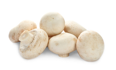 Fresh champignon mushrooms on white background