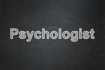 Healthcare concept: text Psychologist on Black chalkboard background