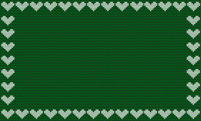 Emerald green fabric knitted background framed with knit white hearts