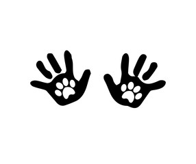 Black silhouette of baby hand prints with animal pawprints inside